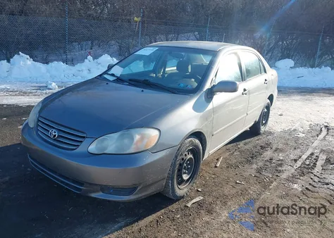 2004 Toyota Corolla Le z USA, uszkodzony, nr VIN 2T1BR32E84C181854